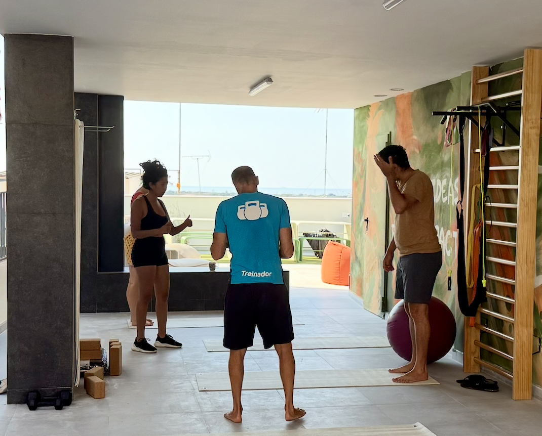 Residents doing fitness on the terrace at Green Living Coliving Barcelona